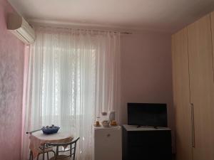 TV a/nebo společenská místnost v ubytování Francesca