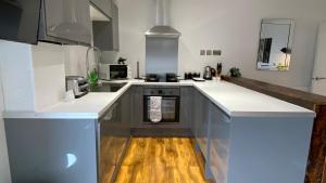 Η κουζίνα ή μικρή κουζίνα στο De Parys Penthouse 5 in Bedford
