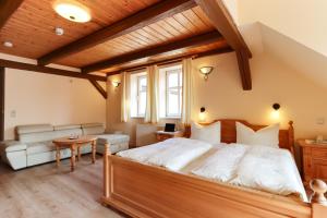Letto o letti in una camera di Am Anger