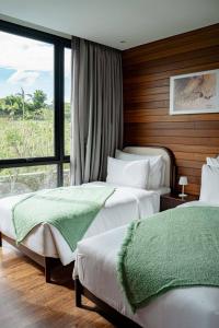 Ένα ή περισσότερα κρεβάτια σε δωμάτιο στο Desagha Cabin