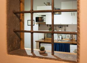 Kuchyň nebo kuchyňský kout v ubytování Bed & Tower + 37 fotografií