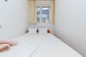 Posteľ alebo postele v izbe v ubytovaní Apartment JoviZ