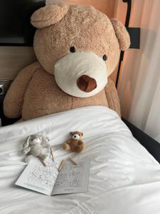 Cama ou camas em um quarto em Novotel Angers Centre Gare