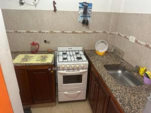 Nhà bếp/bếp nhỏ tại Alquiler de departamento temporario