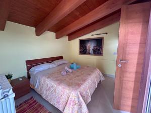 Posteľ alebo postele v izbe v ubytovaní LA VILLA IN CAMPAGNA