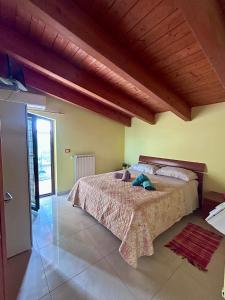 Posteľ alebo postele v izbe v ubytovaní LA VILLA IN CAMPAGNA