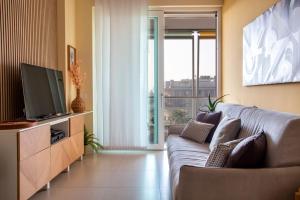 TV a/nebo společenská místnost v ubytování Jesolo Vista Lido Retreat