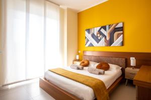 Postel nebo postele na pokoji v ubytování Jesolo Vista Lido Retreat