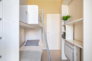 Postel nebo postele na pokoji v ubytování Jesolo Vista Lido Retreat
