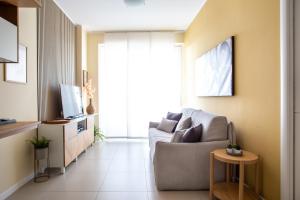 TV a/nebo společenská místnost v ubytování Jesolo Vista Lido Retreat
