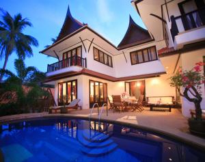 Bazén v ubytování Paradise Island Estate nebo v jeho okolí