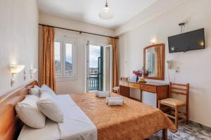 Afbeelding uit fotogalerij van Lemonis Rooms in Skopelos Town +17 foto's