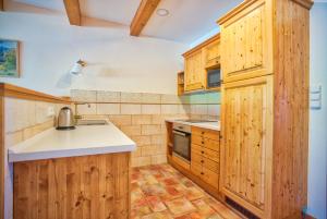 Kuchyňa alebo kuchynka v ubytovaní Apartmány nad stájemi - Jítravský Dvorec