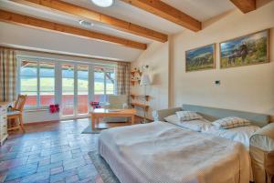 Posteľ alebo postele v izbe v ubytovaní Apartmány nad stájemi - Jítravský Dvorec