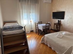 A bed or beds in a room at Villa Rita