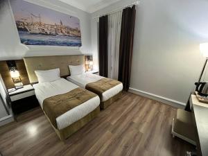 City Center Hotel Taksim İstanbul客房内的一张或多张床位