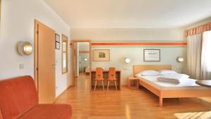Postel nebo postele na pokoji v ubytování Hotel Sparerhof + 37 fotografií