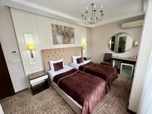 City Center Hotel Taksim İstanbul客房内的一张或多张床位