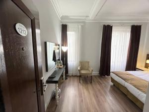 City Center Hotel Taksim İstanbul客房内的一张或多张床位