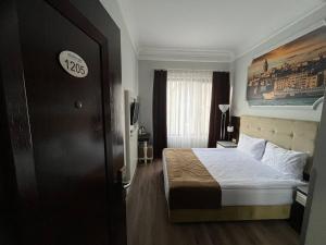 City Center Hotel Taksim İstanbul客房内的一张或多张床位