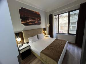 City Center Hotel Taksim İstanbul客房内的一张或多张床位