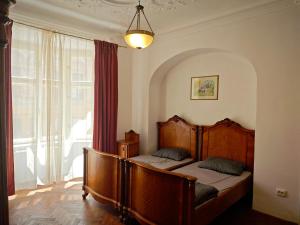 Ένα ή περισσότερα κρεβάτια σε δωμάτιο στο Clasic Studio Central