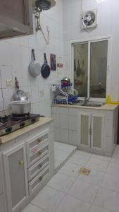 Kuchyň nebo kuchyňský kout v ubytování Gulf Gateway Hostel