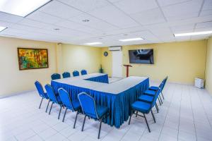 Área de negócios e/ou sala de conferências em Blue Horizon Hotel