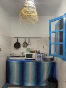 Una cocina o cocineta en Atelier Xauen