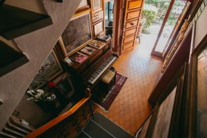 an overhead view of a living room with a staircase at Enzo’s House in Lucca