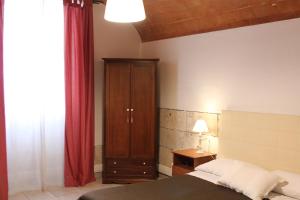 Postel nebo postele na pokoji v ubytování Bed & Tower