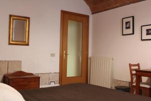 Postel nebo postele na pokoji v ubytování Bed & Tower