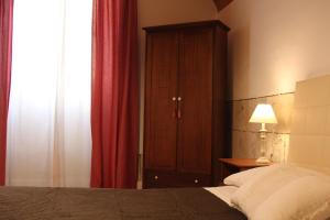 Postel nebo postele na pokoji v ubytování Bed & Tower