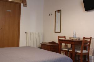 Postel nebo postele na pokoji v ubytování Bed & Tower