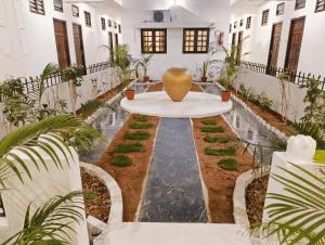 Zahrada ubytování Hare Rama Hare Krishna - EESHA Hotel