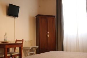 TV a/nebo společenská místnost v ubytování Bed & Tower