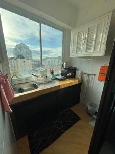 Η κουζίνα ή μικρή κουζίνα στο Monkey apartment 6