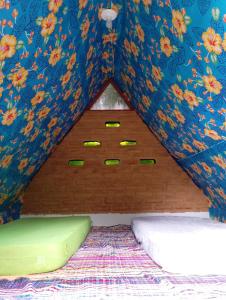 a room with a bed in a tent at Recanto Vale da Lua in Passa Quatro +15 photos