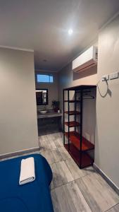 Ένα ή περισσότερα κρεβάτια σε δωμάτιο στο Alpha House Hostel II