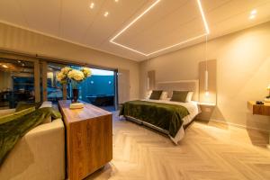 Postel nebo postele na pokoji v ubytování Cottage 1 - Leo Sky Farm + 18 fotografií