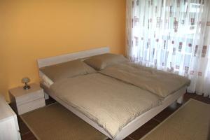 Postel nebo postele na pokoji v ubytování Casa Kito by HolAp SA