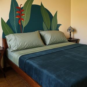 Postel nebo postele na pokoji v ubytování El Oasis Hotel
