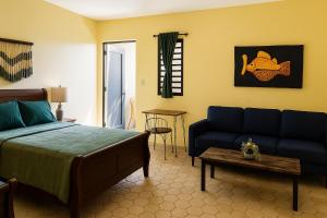 Postel nebo postele na pokoji v ubytování El Oasis Hotel