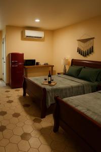 Kuchyň nebo kuchyňský kout v ubytování El Oasis Hotel