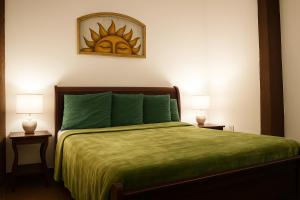 Postel nebo postele na pokoji v ubytování El Oasis Hotel