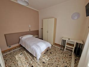 Albergo D'Ambros - Casa Belfiore Group客房内的一张或多张床位