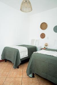 Postel nebo postele na pokoji v ubytování Central Hostel Pondicherry