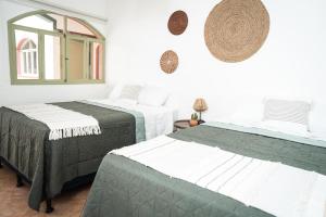 Postel nebo postele na pokoji v ubytování Central Hostel Pondicherry