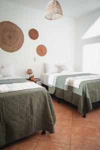 Postel nebo postele na pokoji v ubytování Central Hostel Pondicherry