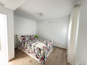 Cama o camas de una habitación en La casa de la playa